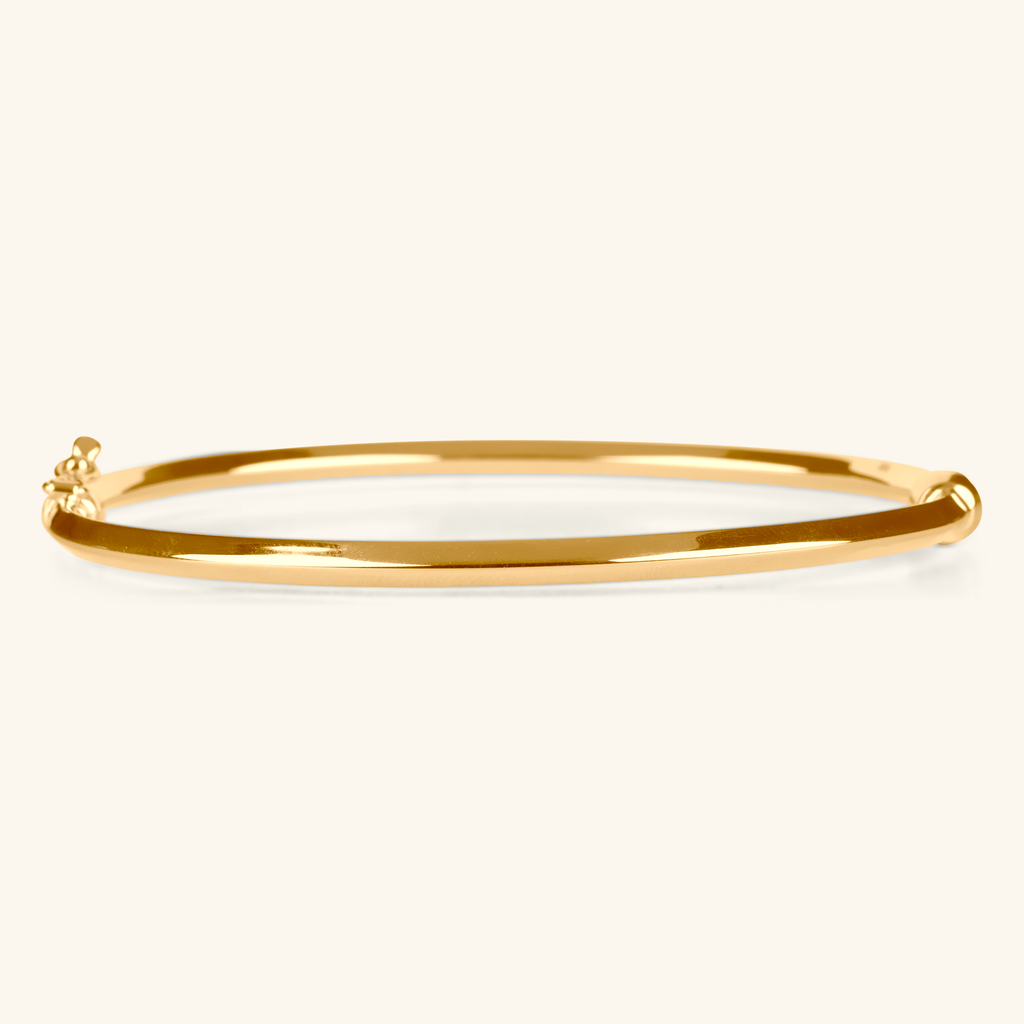 Angled Bangle, Made in 14k hollowed gold