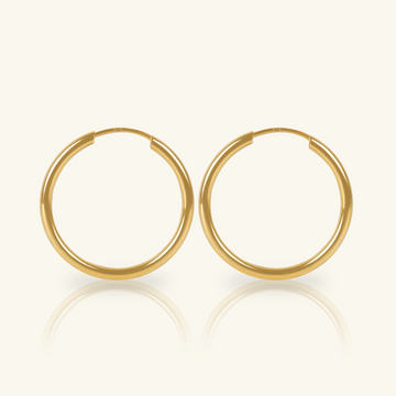 Medium Easy Hoops, Made in 18k hallowed gold.