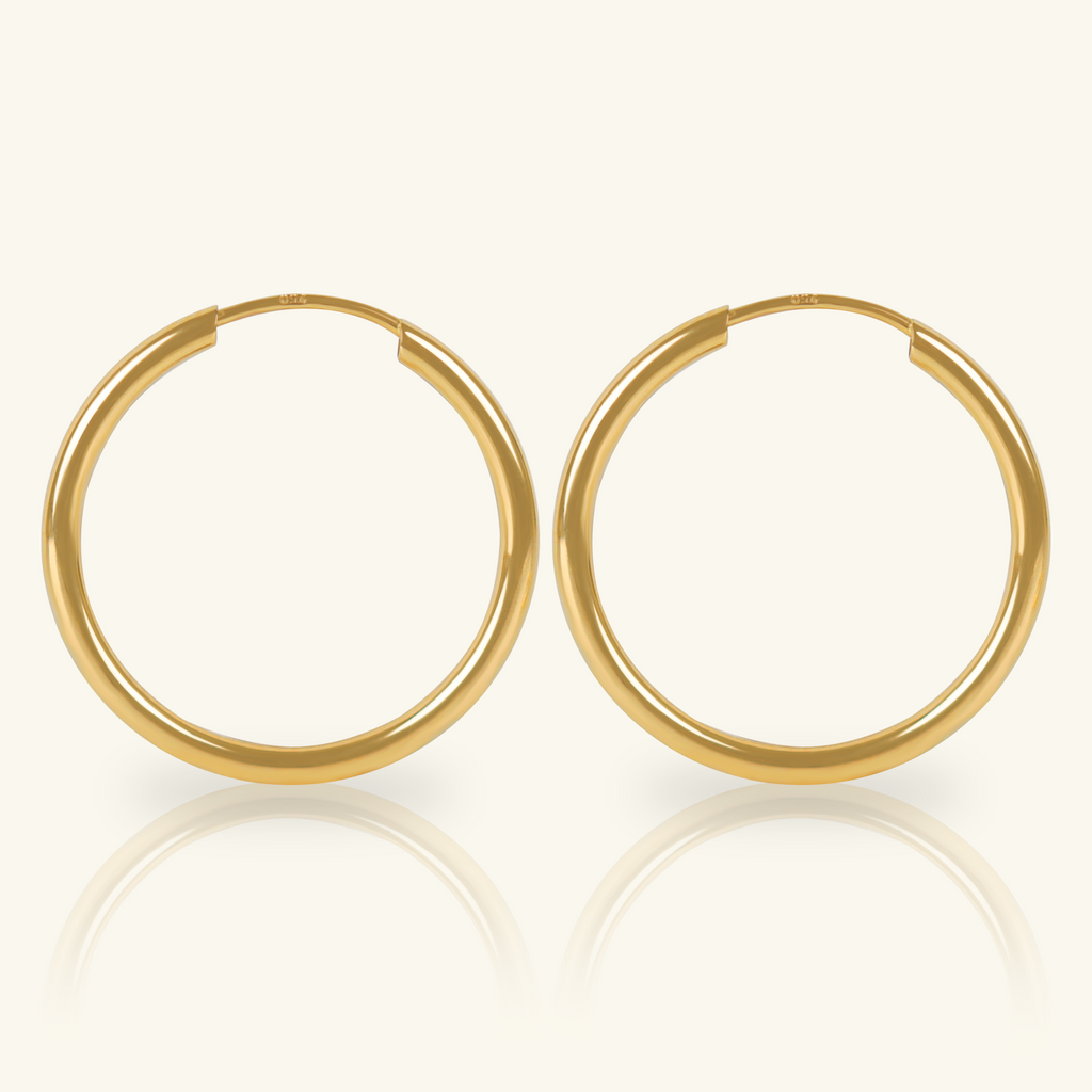 Large Easy Hoops, Made in 18k hallowed gold.