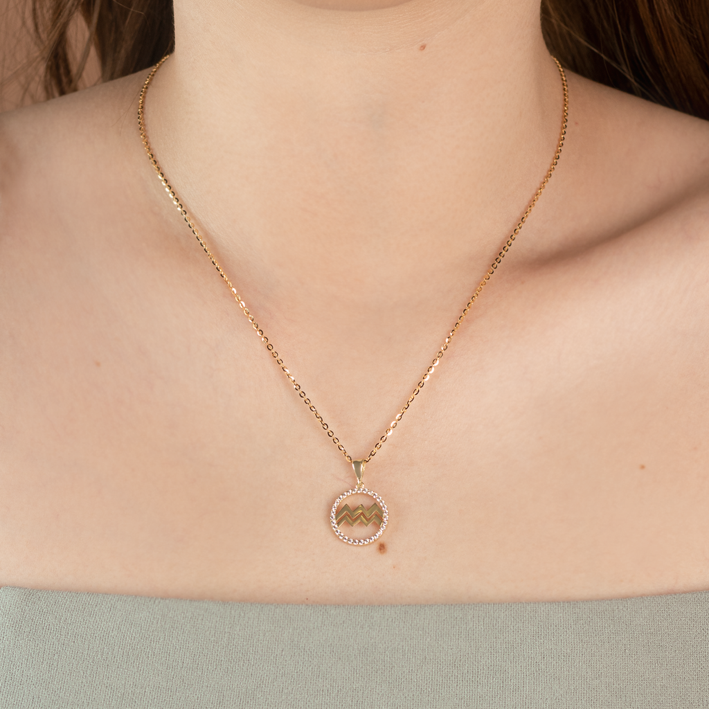 Aquarius Pendant 14k gold stacked on model neck – Foundry