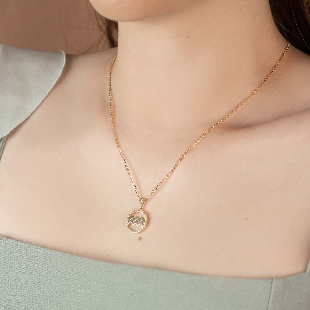 Aquarius Pendant 14k gold stacked on model neck – Foundry