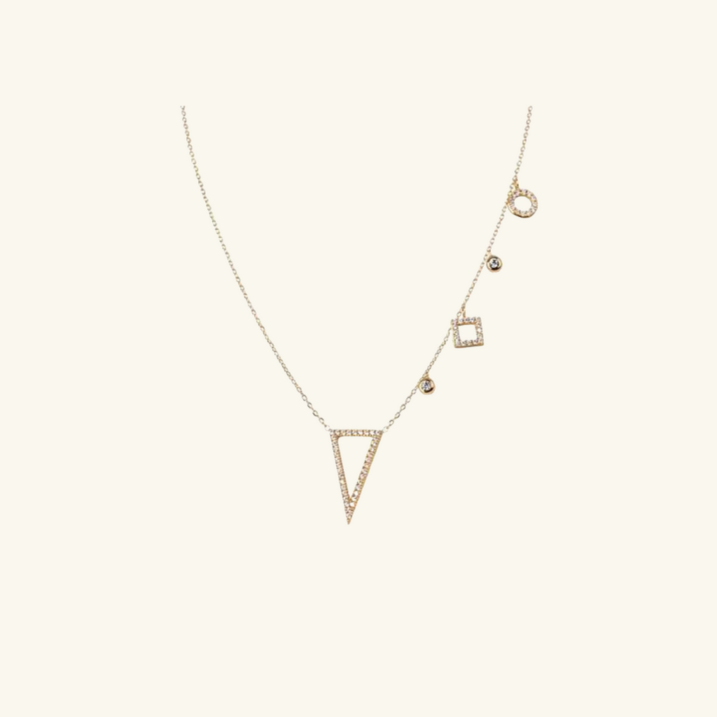 Gold Vermei Asymmetry Charm Necklace, front view – Foundry Jewelry