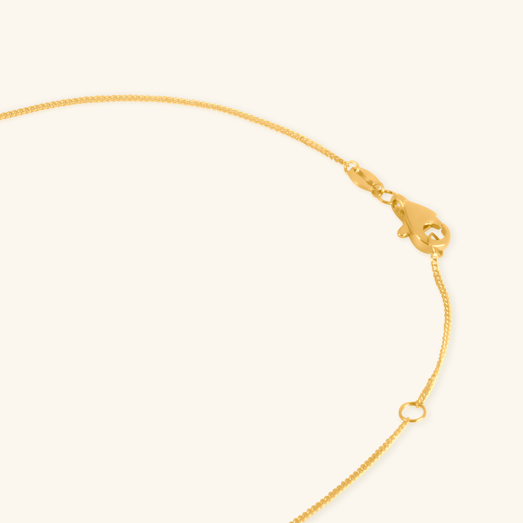 Close-up of lobster clasp on Baguette Cut Cz Necklace 14k gold – Foundry