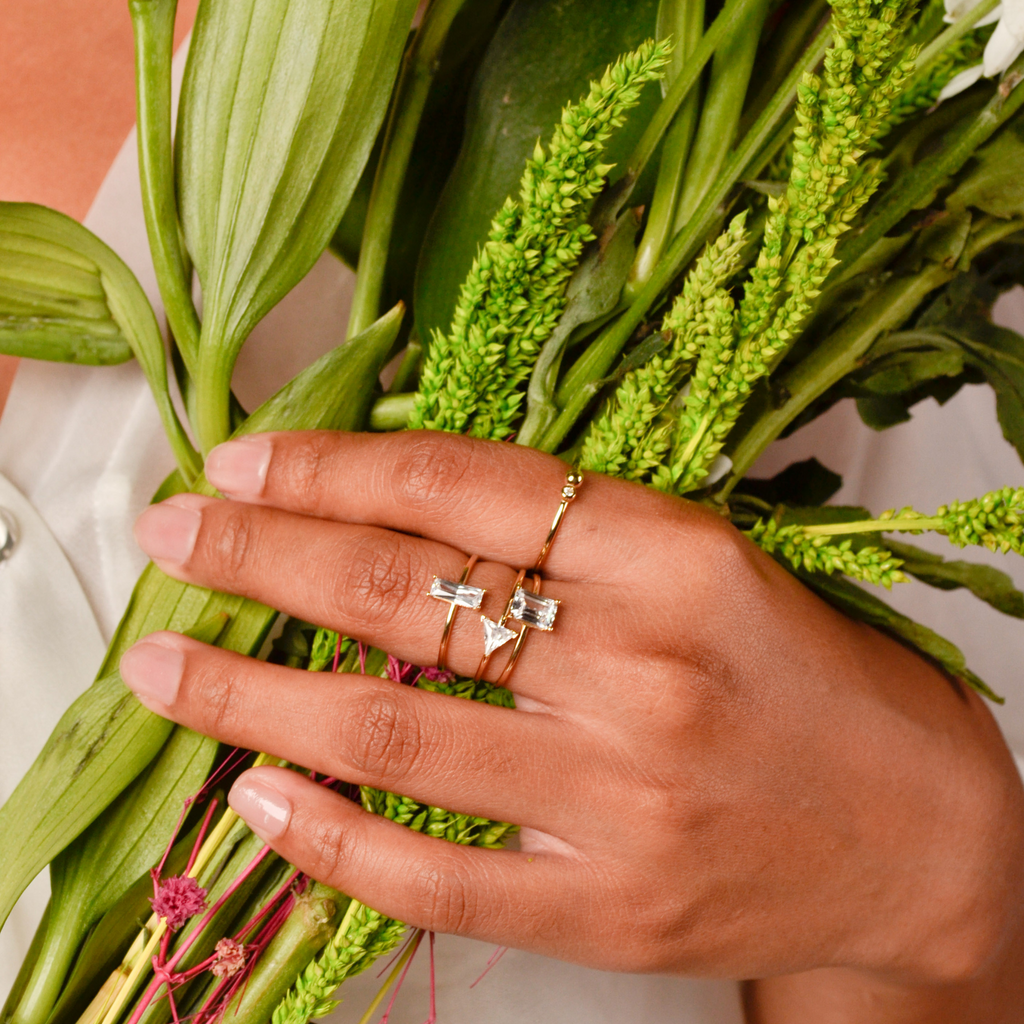 Baguette Stacker Ring 14k gold stacked on model finger – Foundry