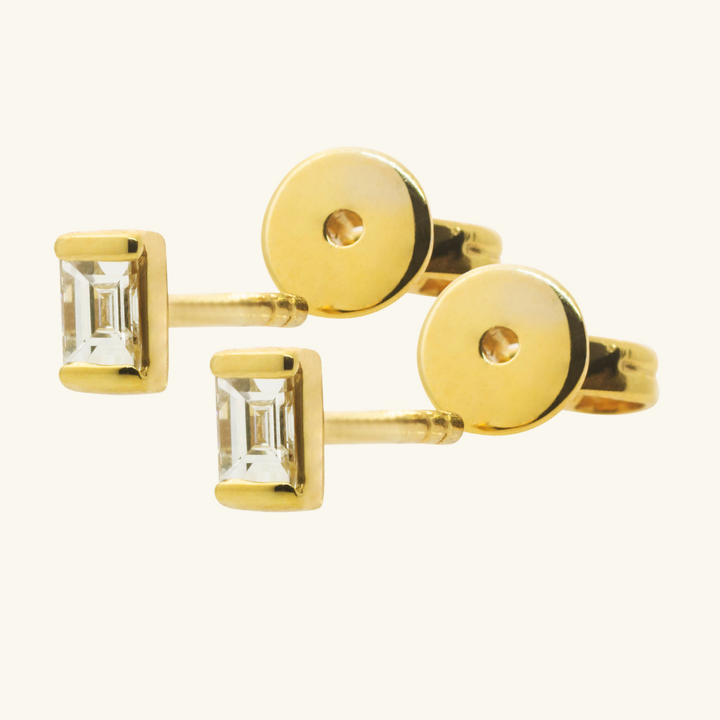 Close-up of Push back post lock clasp on Baguette Diamond Studs 14k gold – Foundry