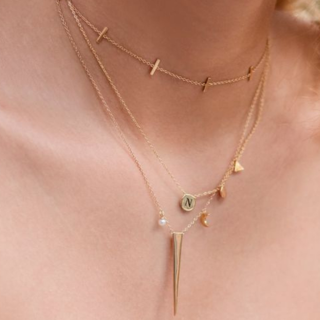 Bar Station Necklace Gold Vermeil stacked on model neck – Foundry