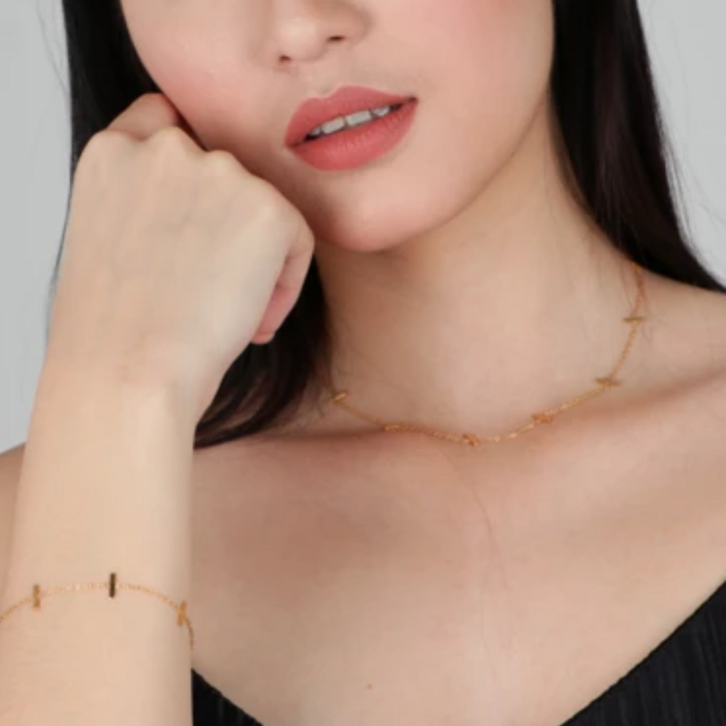 Bar Station Necklace stacked on model neck – Foundry