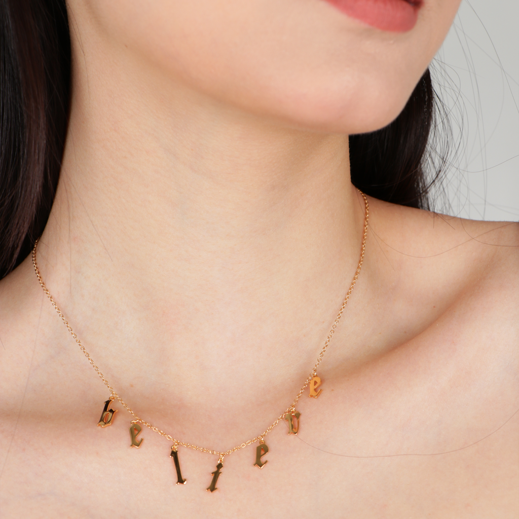Believe Necklace Gold vermeil stacked on model neck – Foundry