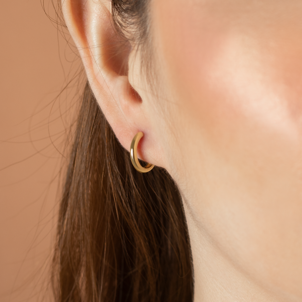 Between Clouds Hoops 14k gold stacked on model ear – Foundry