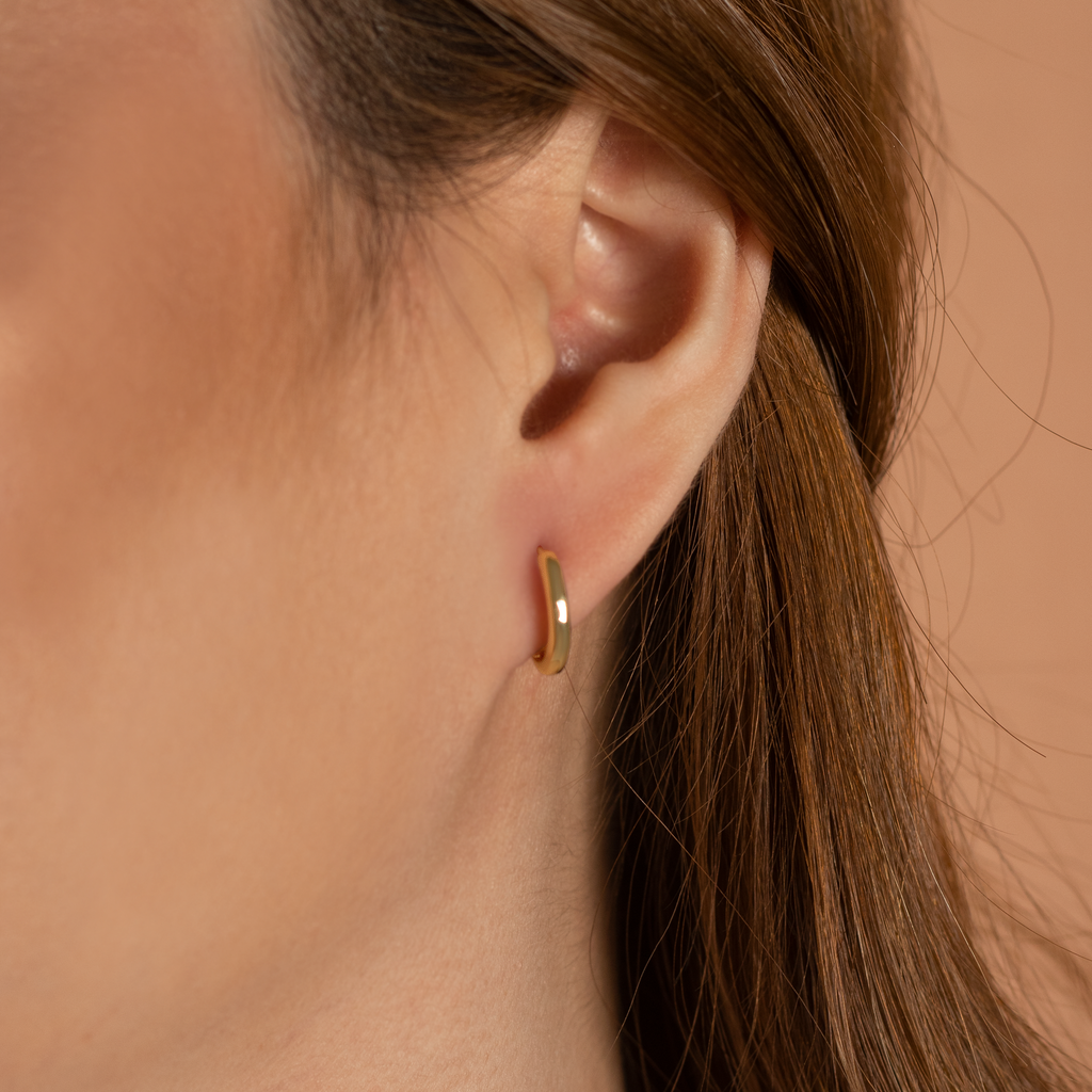 Between Clouds Hoops 14k gold stacked on model ear – Foundry