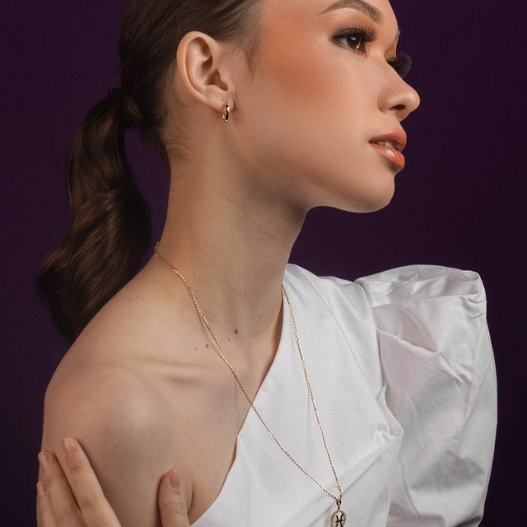 Between Clouds Hoops 14k gold stacked on model ear – Foundry