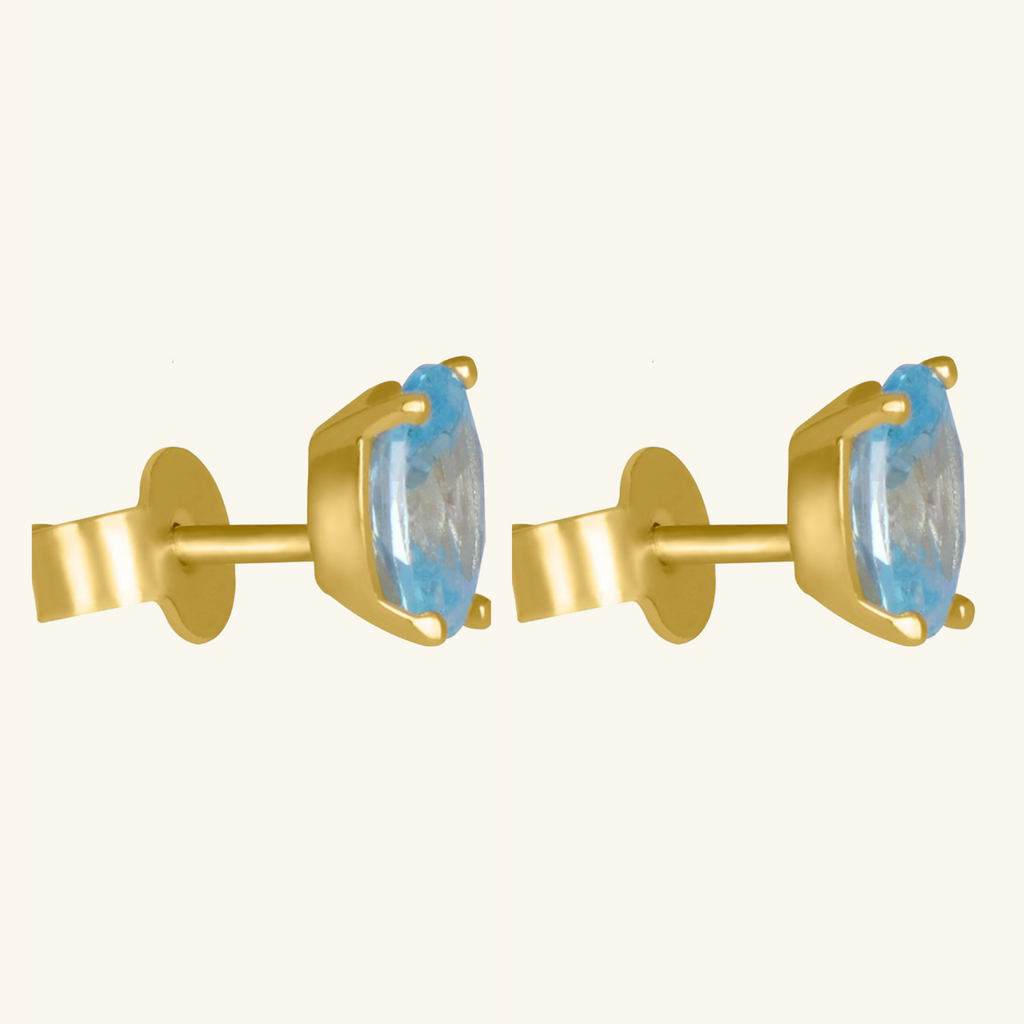 Close-up of push back post lock on Birthstone Oval Studs Blue Topaz 18k gold – Foundry
