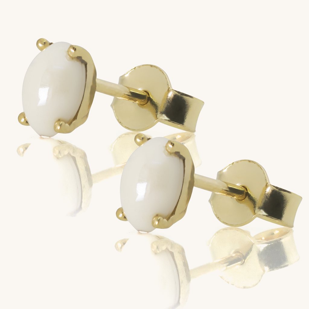 Close-up of push back post lock on Birthstone Oval Studs Pearl 18k gold – Foundry