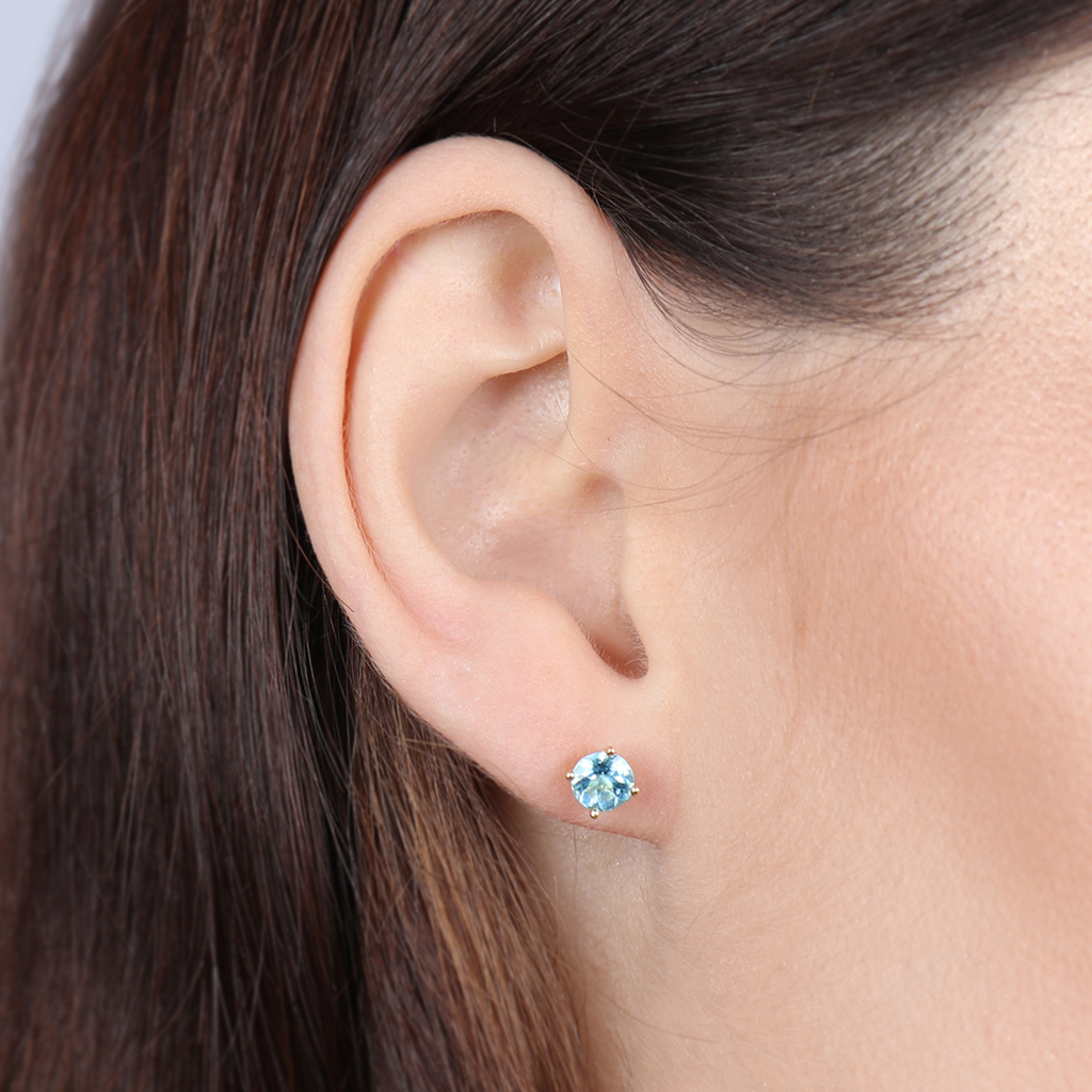 Birthstone Round Earring December Topaz CZ 14k gold stacked on model ear – Foundry