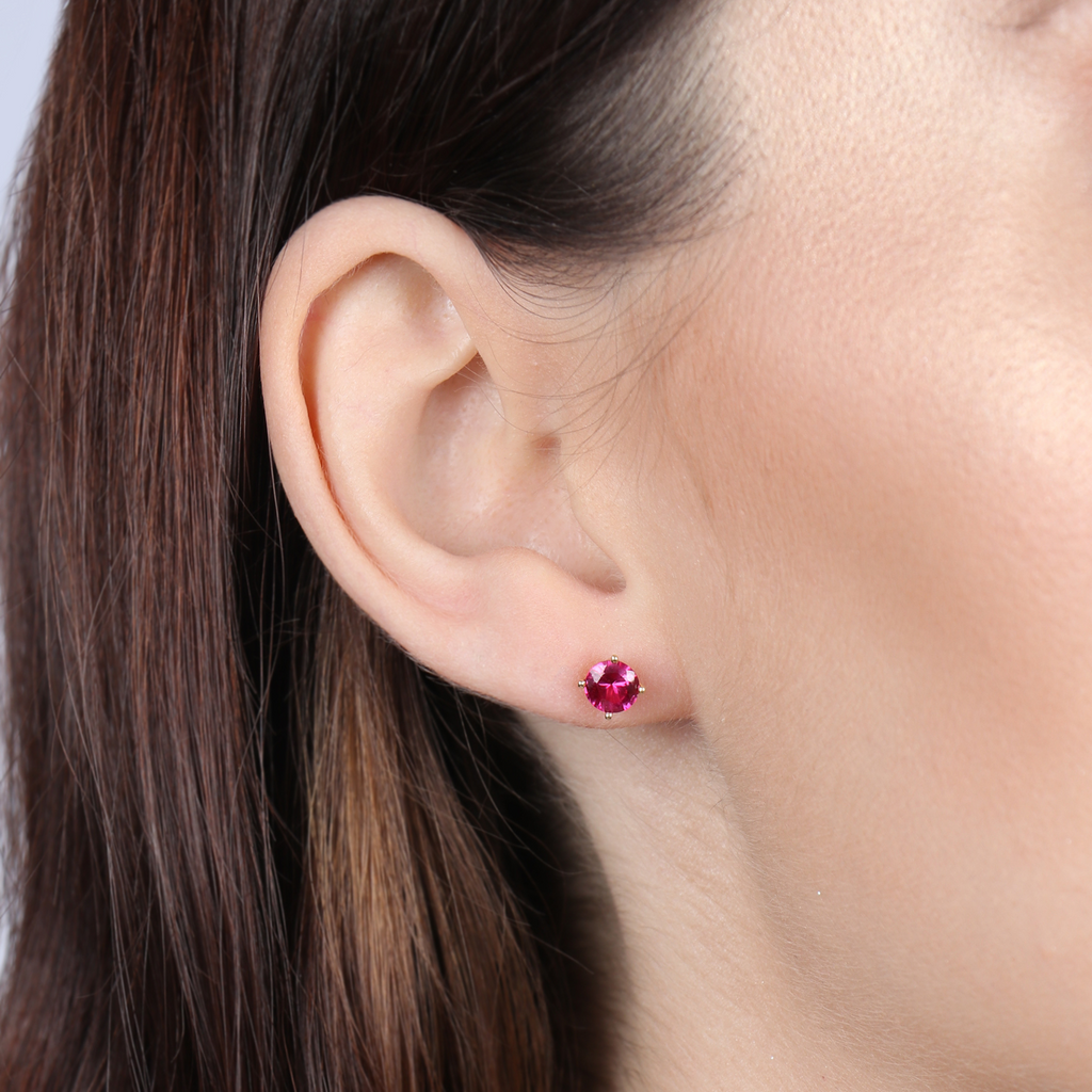 Birthstone Round Earrings July Ruby  18k gold stacked on model ear – Foundry