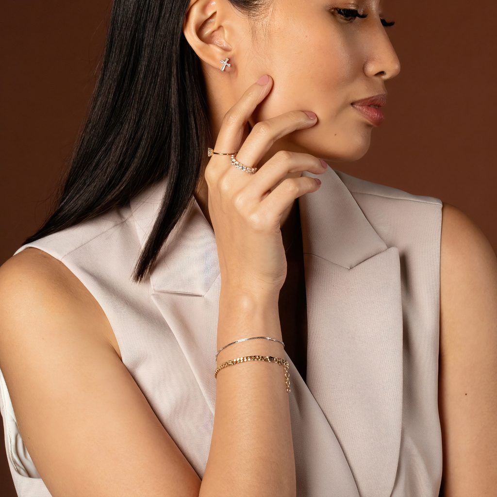 Bold Box Chain Bracelet 14k gold stacked on model wrist – Foundry