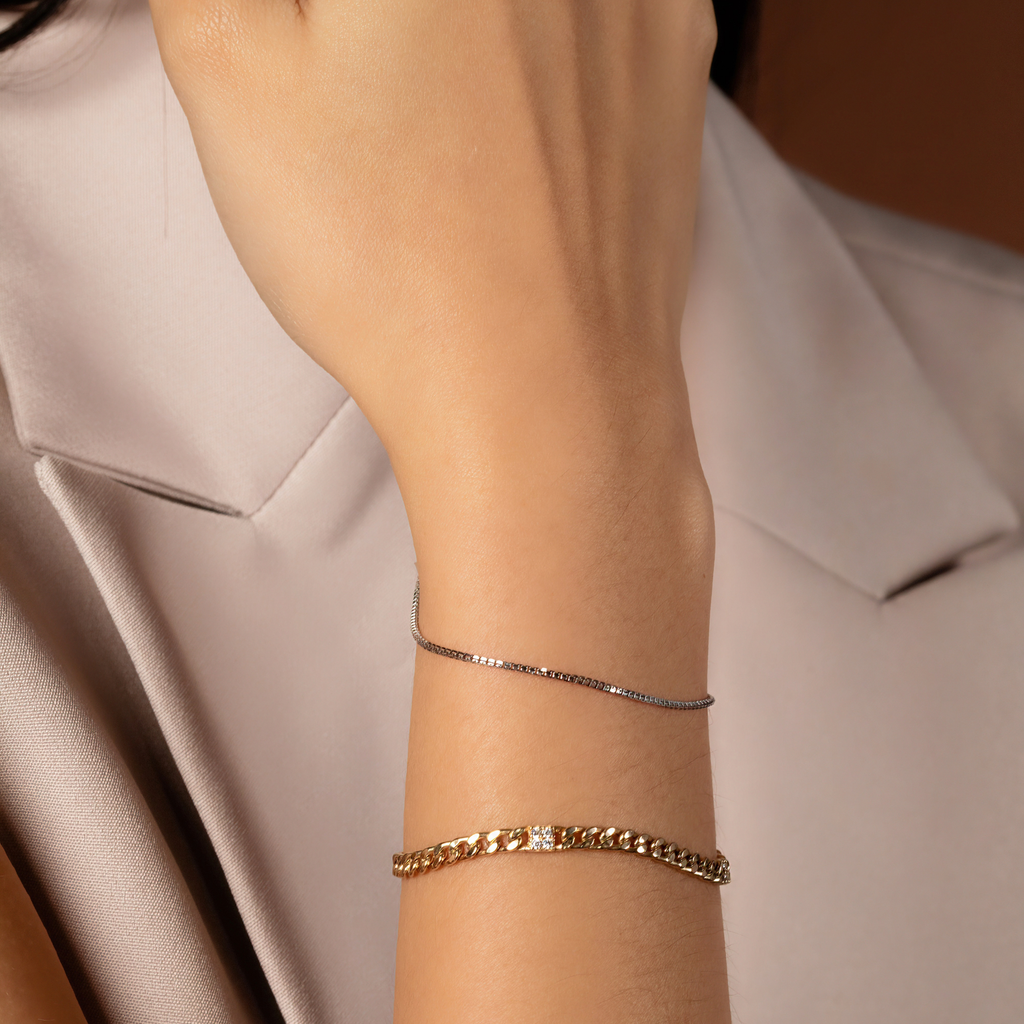 Bold Box Chain Bracelet 14k gold stacked on model wrist – Foundry
