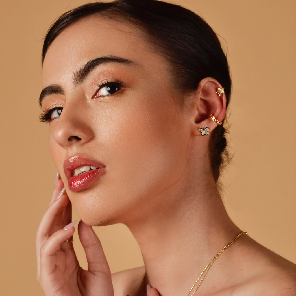 Chain Hoops 14k gold stacked on model ear – Foundry