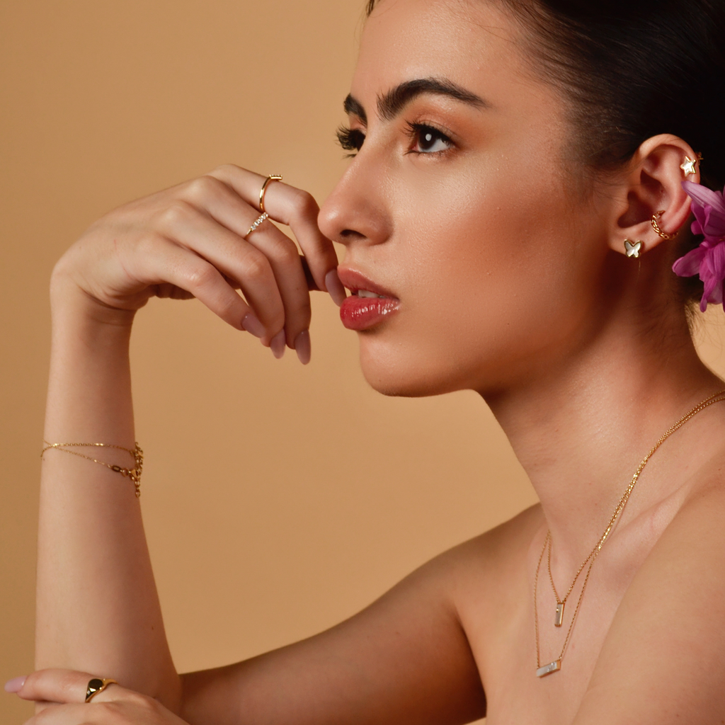 Chain Hoops 14k gold stacked on model ear – Foundry