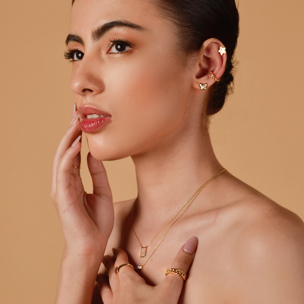 Chain Hoops 14k gold stacked on model ear – Foundry