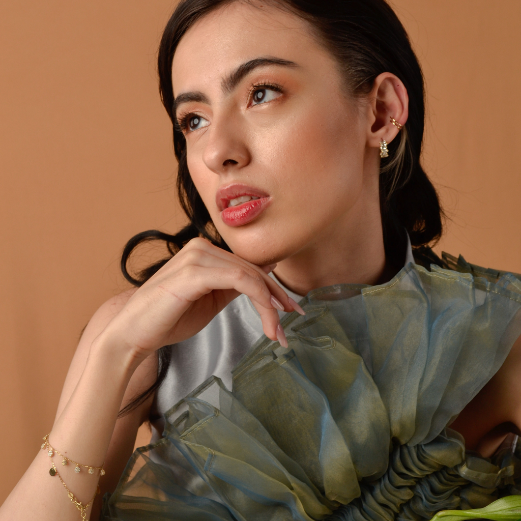 Cluster Baguette Hoops 14k gold stacked on model ear – Foundry