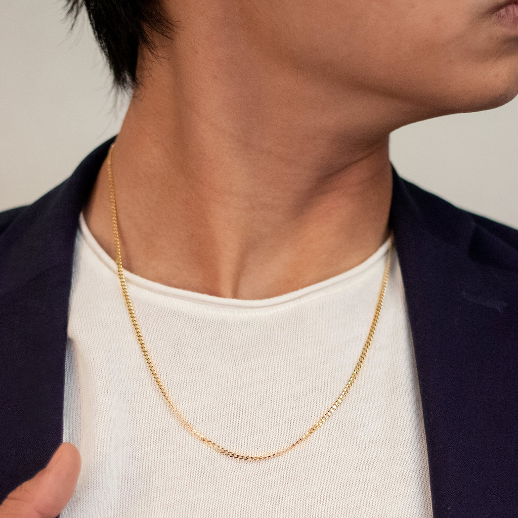 Concave Curb Chain Necklace 18k gold stacked on model neck – Foundry