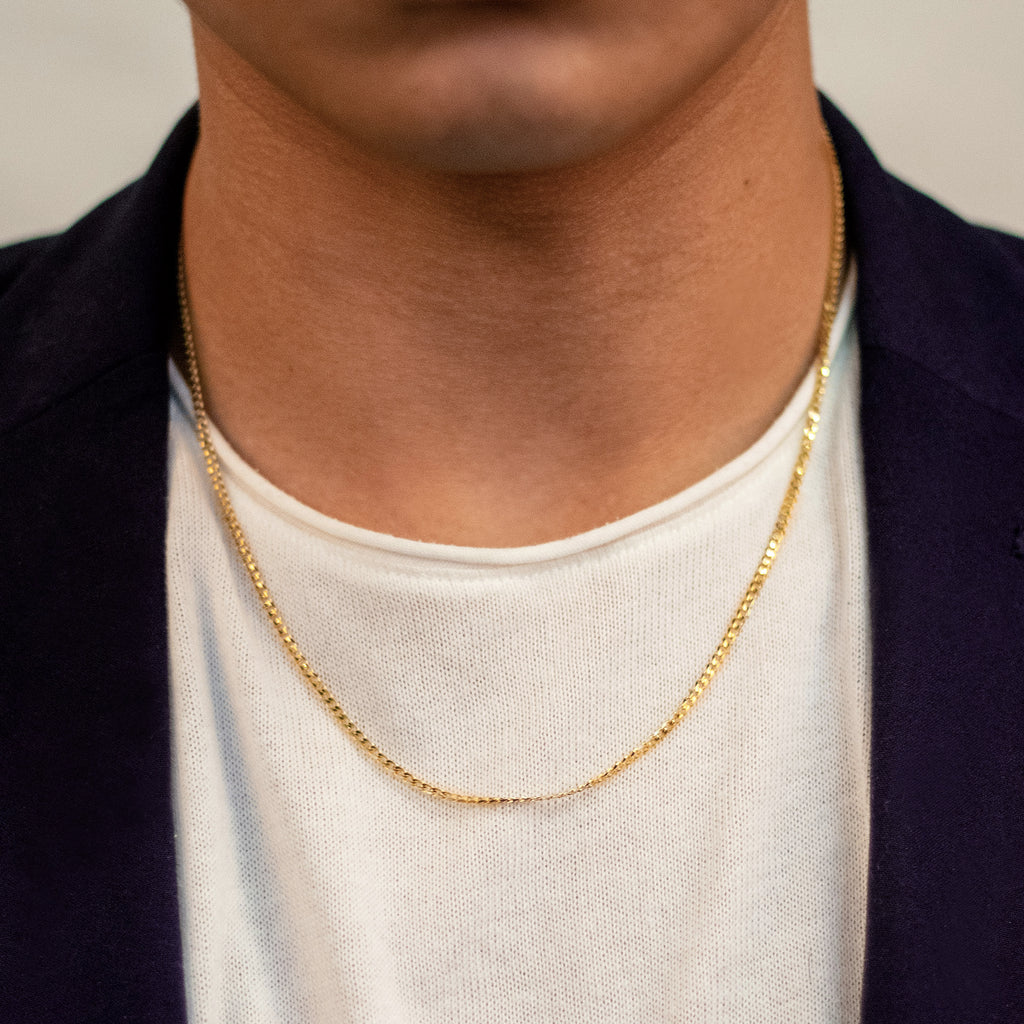Concave Curb Chain Necklace 18k gold stacked on model neck – Foundry