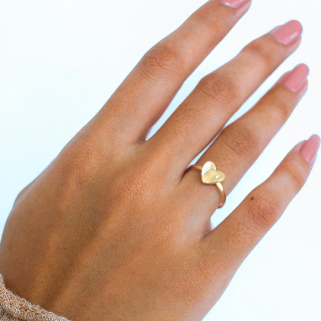 Concave Heart Ring 18k gold stacked on model finger – Foundry