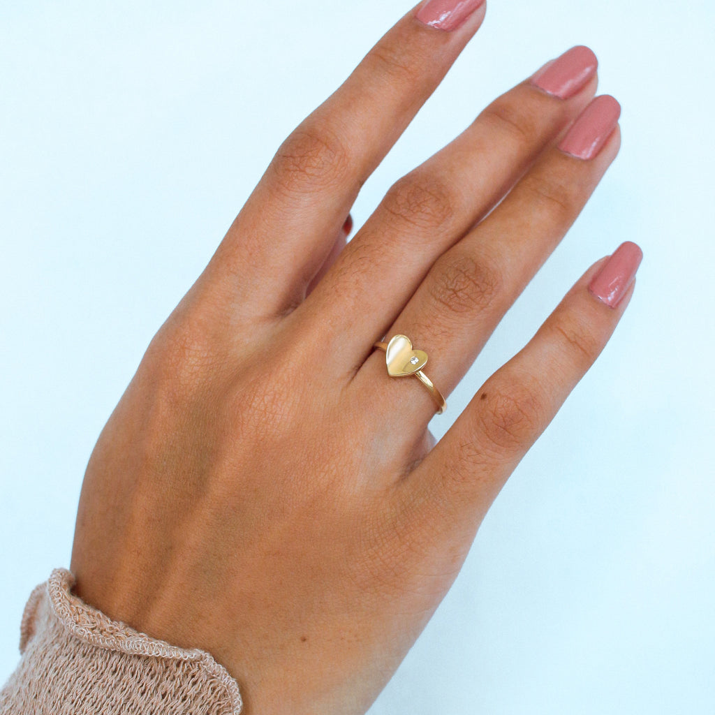 Concave Heart Ring 18k gold stacked on model finger – Foundry