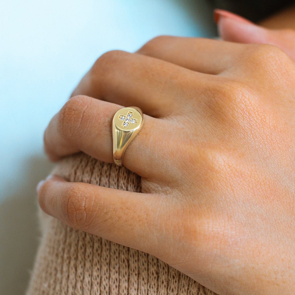 Crossing Signet Ring 18k gold stacked on model finger – Foundry