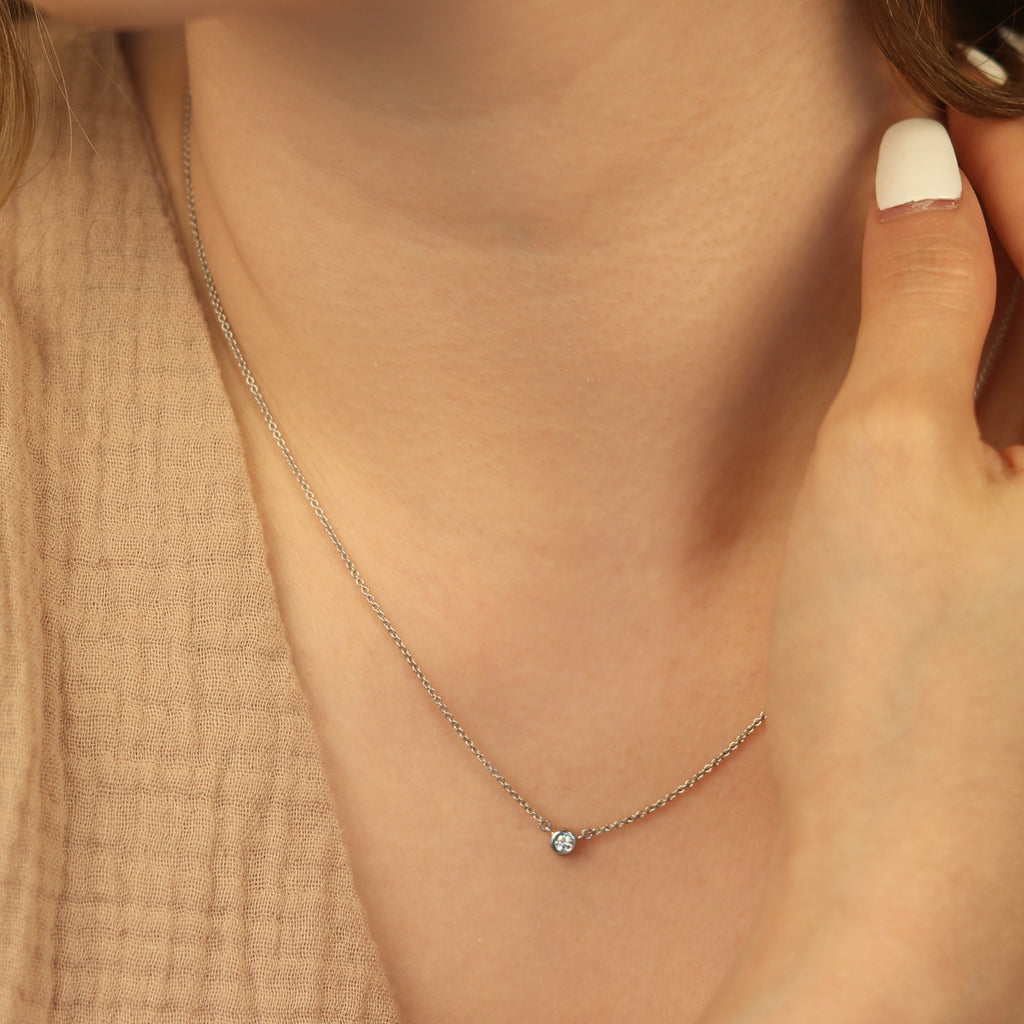 Diamond Necklace 14k white gold stacked on model neck – Foundry