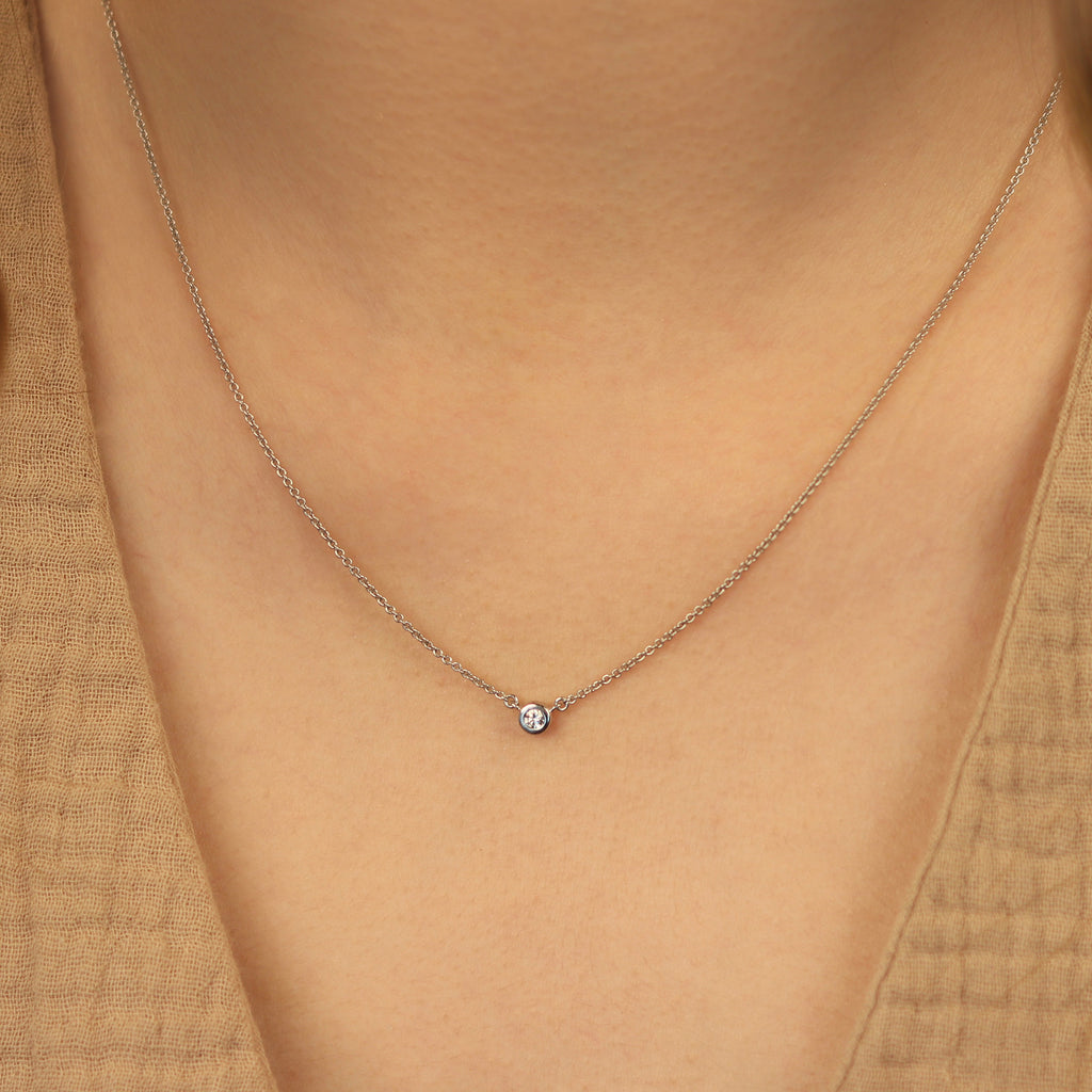 Diamond Necklace 14k white gold stacked on model neck – Foundry