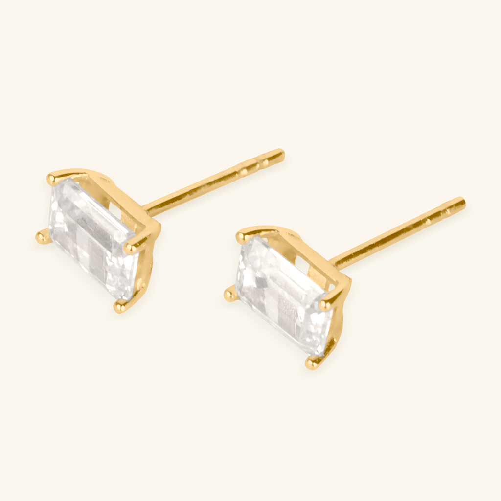 Close-up of push back post lock on Emerald Cut studs 14k gold – Foundry