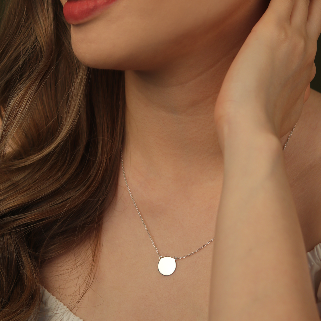 Engravable Blank Disc Necklace Sterling Silver stacked on model neck – Foundry