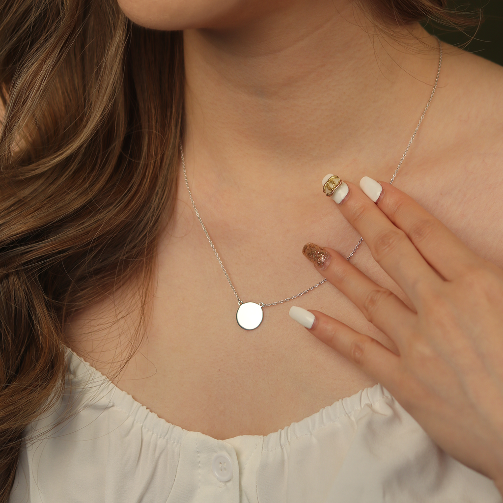 Engravable Blank Disc Necklace Sterling Silver stacked on model neck – Foundry