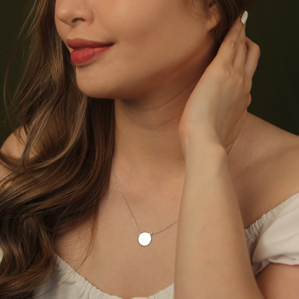 Engravable Blank Disc Necklace Sterling Silver stacked on model neck – Foundry