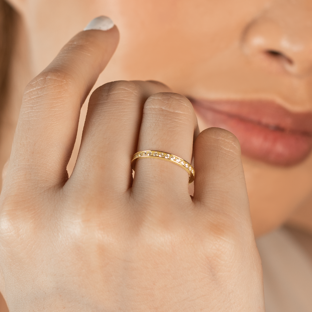 Essential Eternity Ring 14k gold stacked on model finger– Foundry