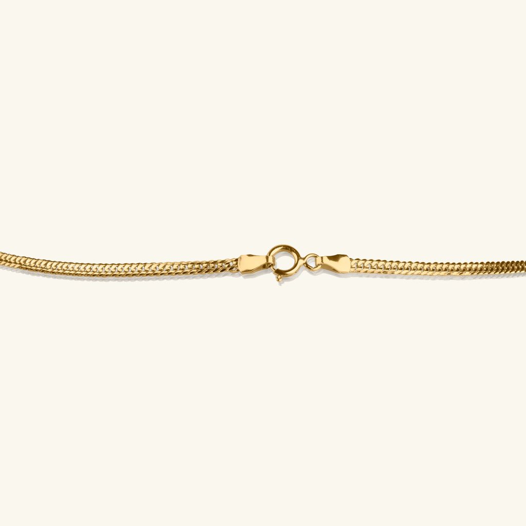 Close-up of spring ring clasp on Flat Curb Necklace 14k gold – Foundry
