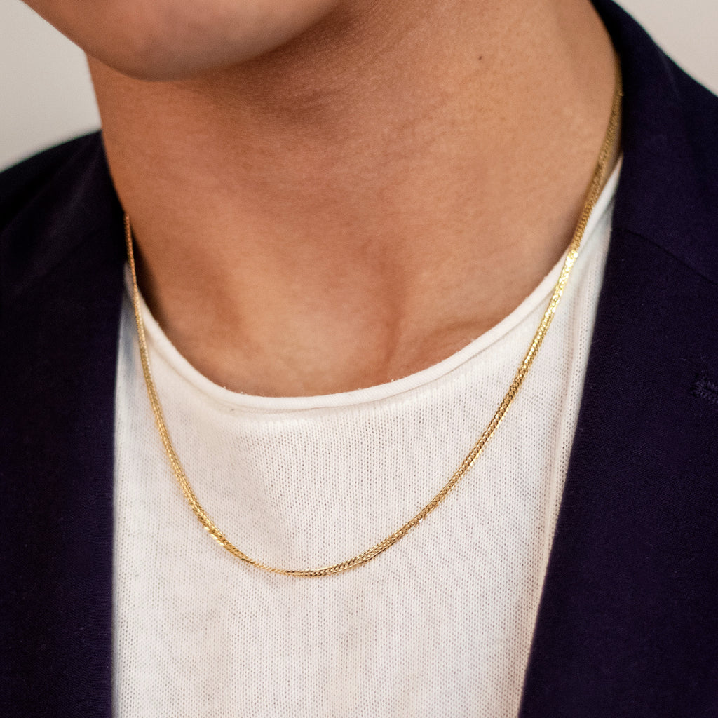Flat Curb Necklace 18k gold stacked on model neck – Foundry