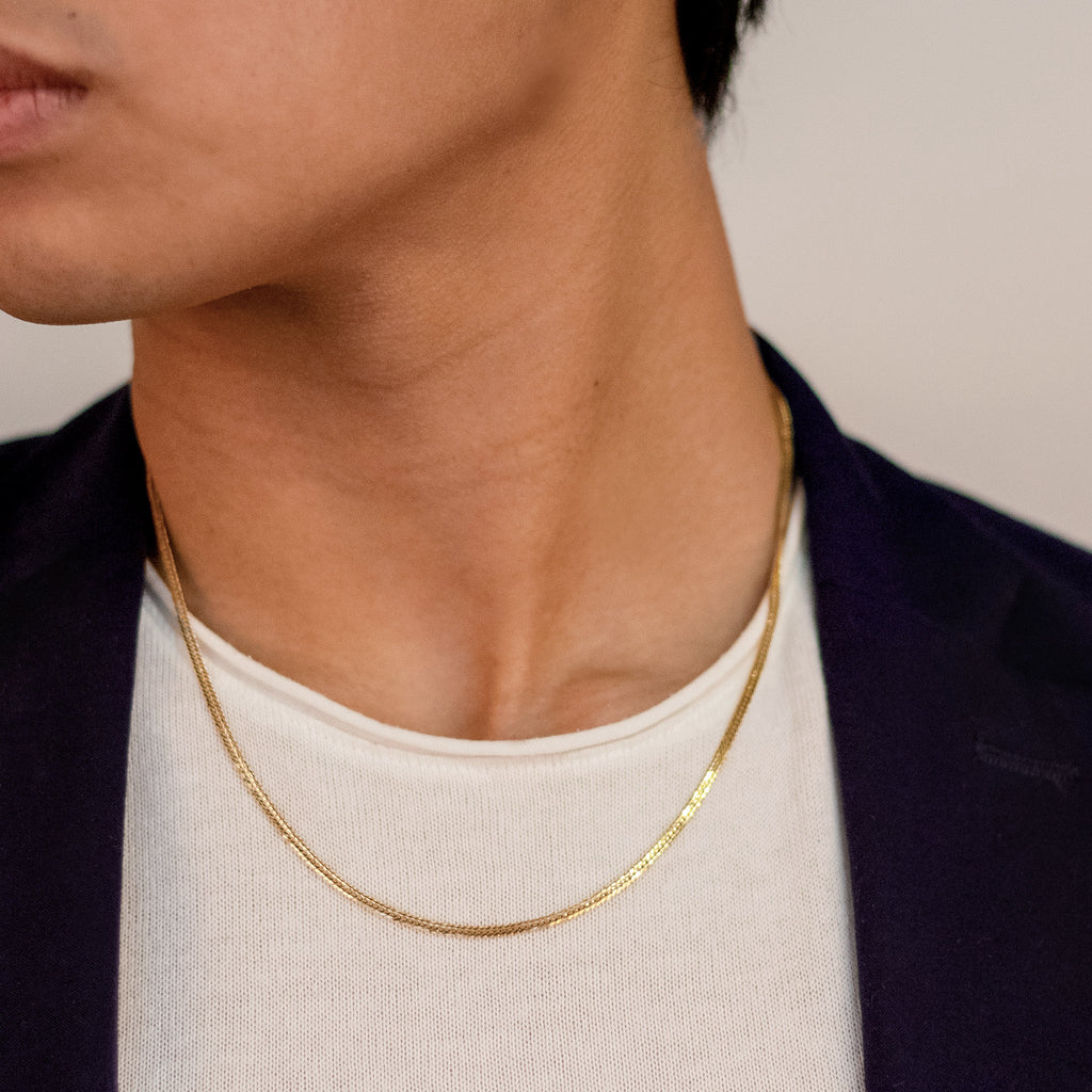 Flat Curb Necklace 18k gold stacked on model neck – Foundry