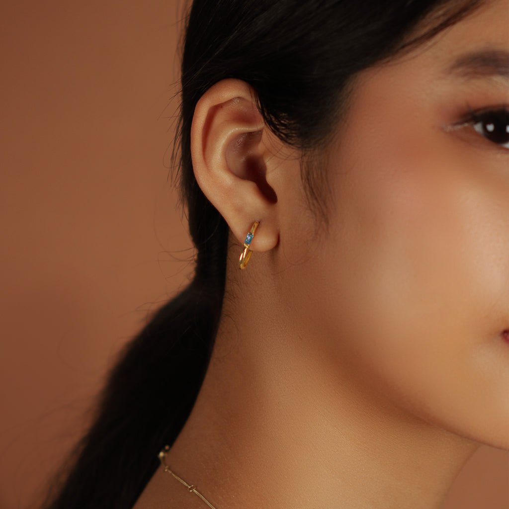 Gemstone U Hoops 18k gold stacked on model ear– Foundry