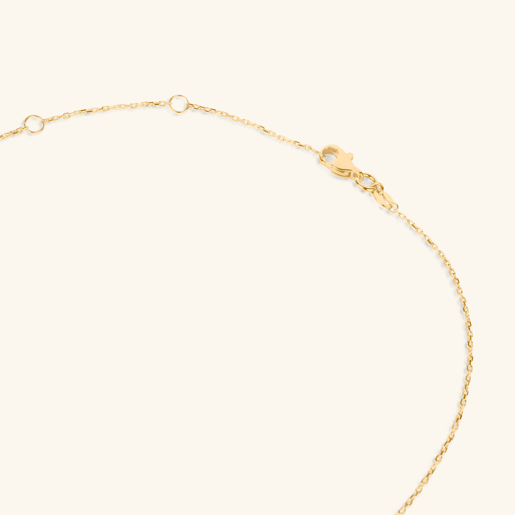 Close-up of lobster clasp on Horizon Engravable Bar Necklace 14k gold – Foundry
