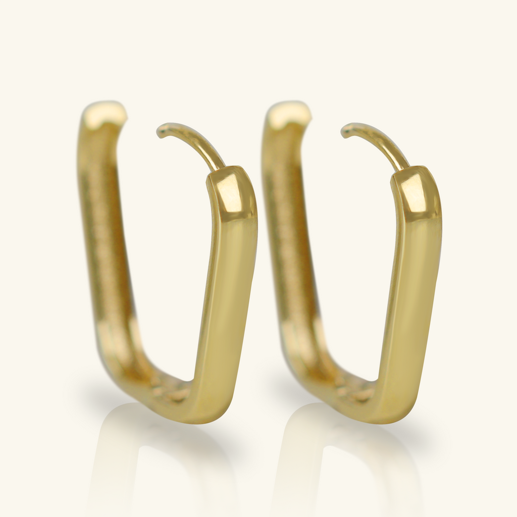 Close-up of saddle back on Huggie U Hoops 18k gold – Foundry
