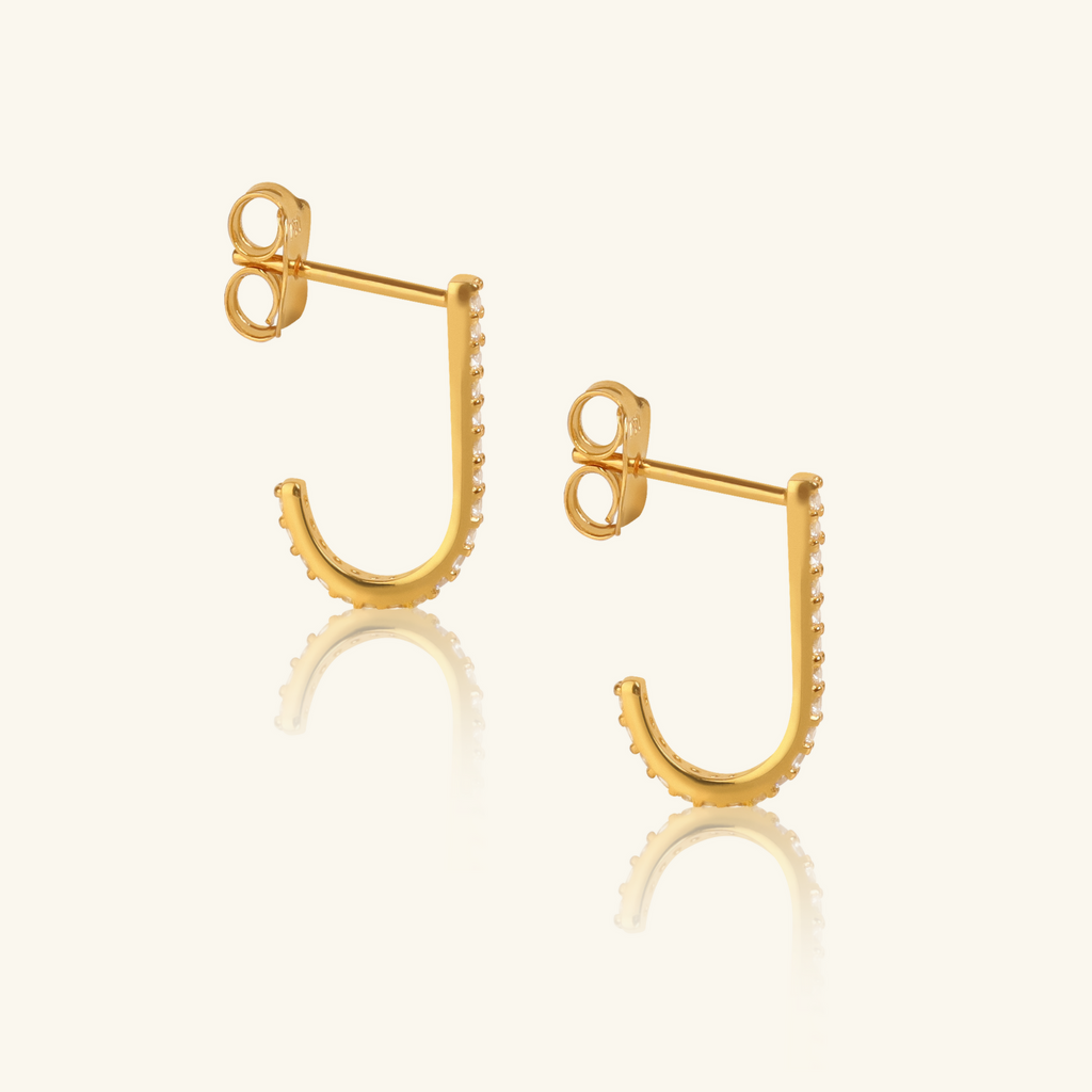 Close-up of push back post lock on J Hook Studs  18k gold – Foundry