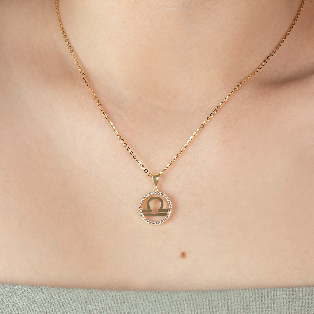 Leo Pendant 14k gold stacked on model neck – Foundry