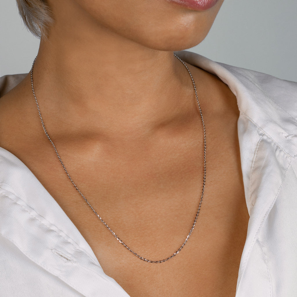 Long Chain Necklace 18k white gold stacked on model neck – Foundry