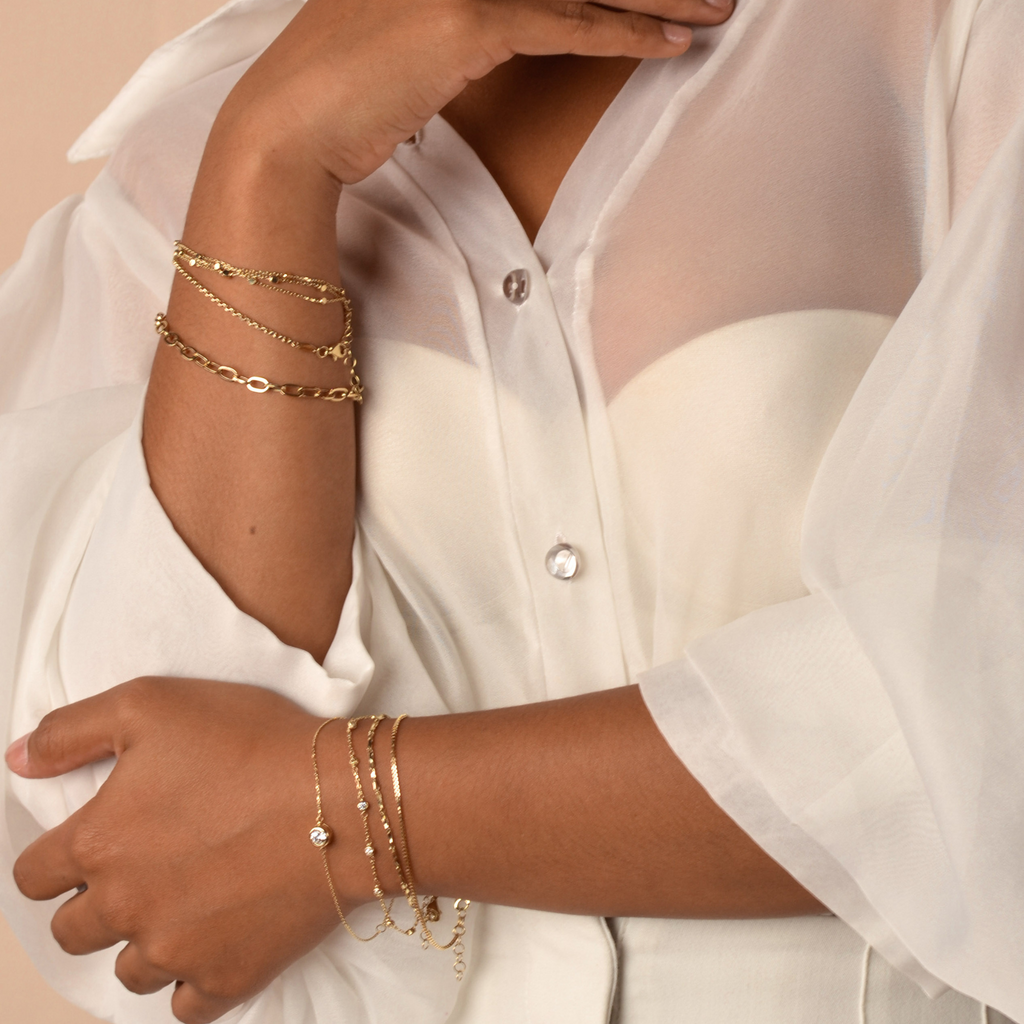 Box Chain Bracelet 14k gold stacked on model wrist – Foundry