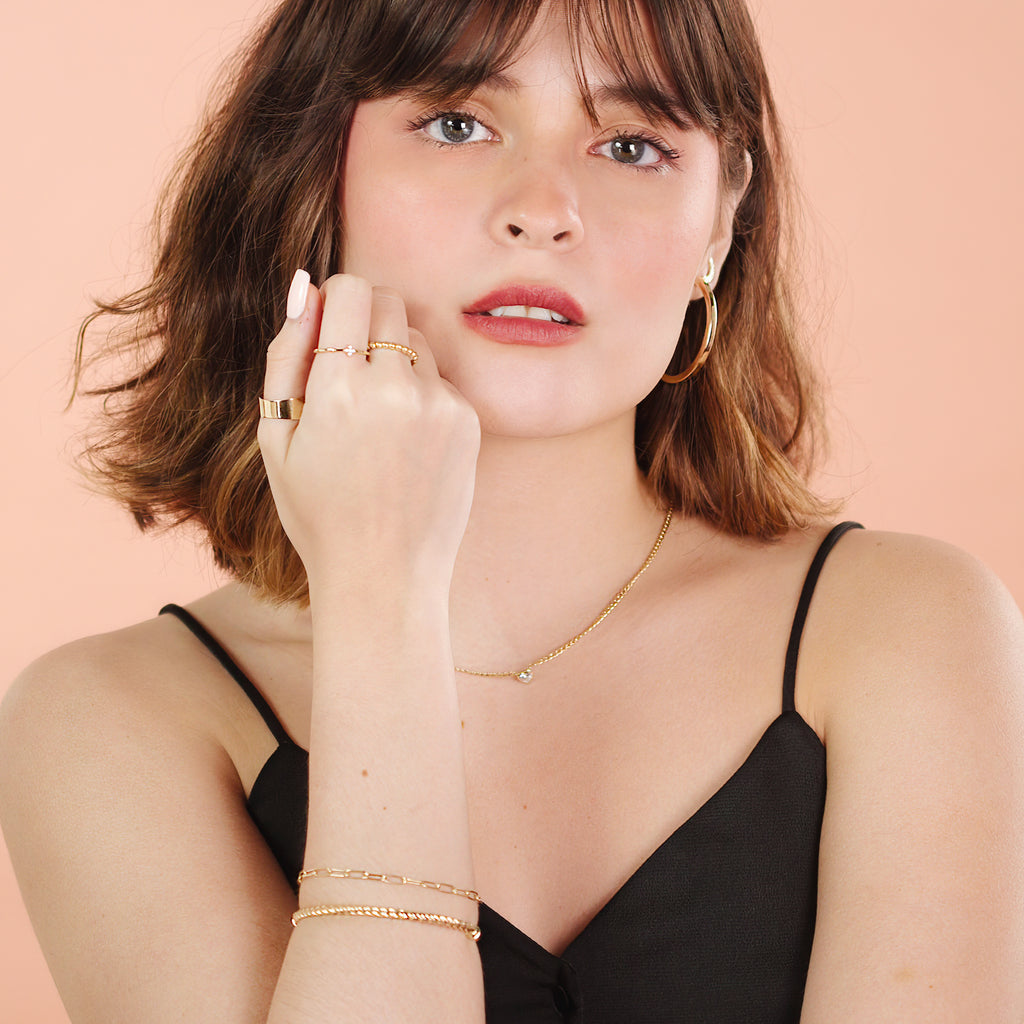 Boyfriend Bracelet 14k gold stacked on model wrist – Foundry