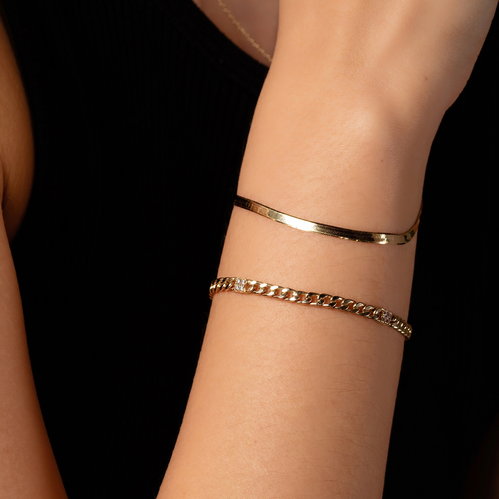 Pave Curb Chain Bracelet 14k gold stacked on model wrist – Foundry