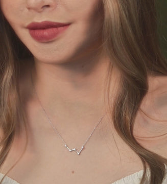Casiopeia Necklace Sterling Silver stacked on model neck, video – Foundry